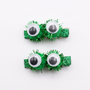 Presilha Tic Tac Pompom Olho Verde com 2 Unid
